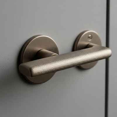 Modern A2P certified door lock with a metallic finish, installed on a wooden door